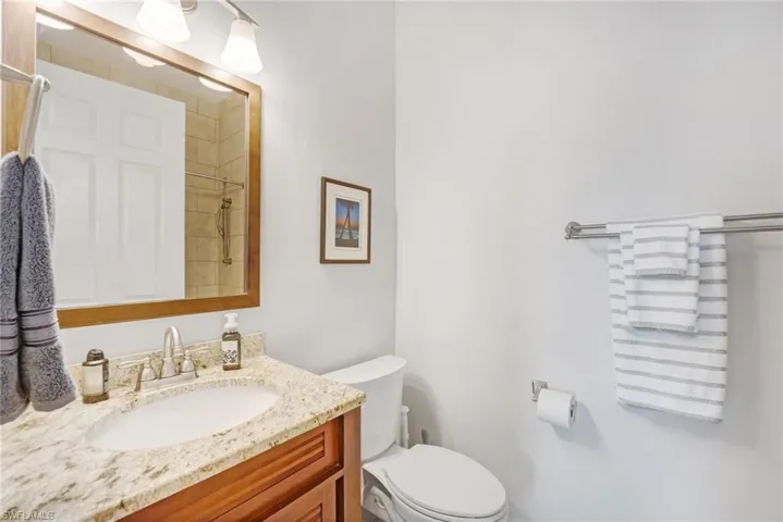 The third bedroom features a private ensuite bath with a tub-shower combination, combining practicality with comfort.