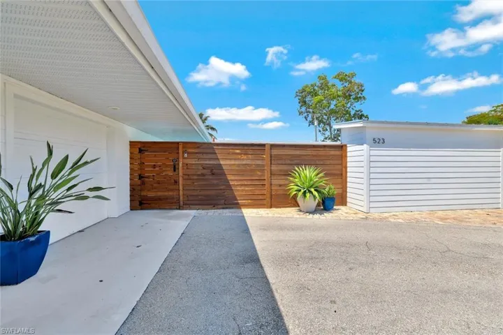 View of patio / terrace with a garage