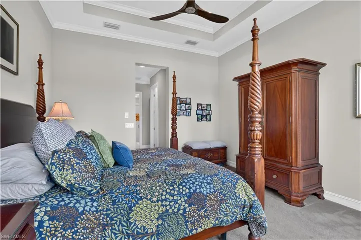 Primary suite with his and her walk in closets.
