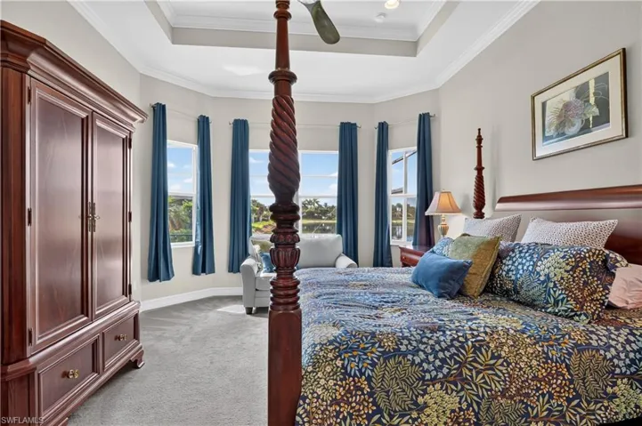 Primary bedroom with lake view.