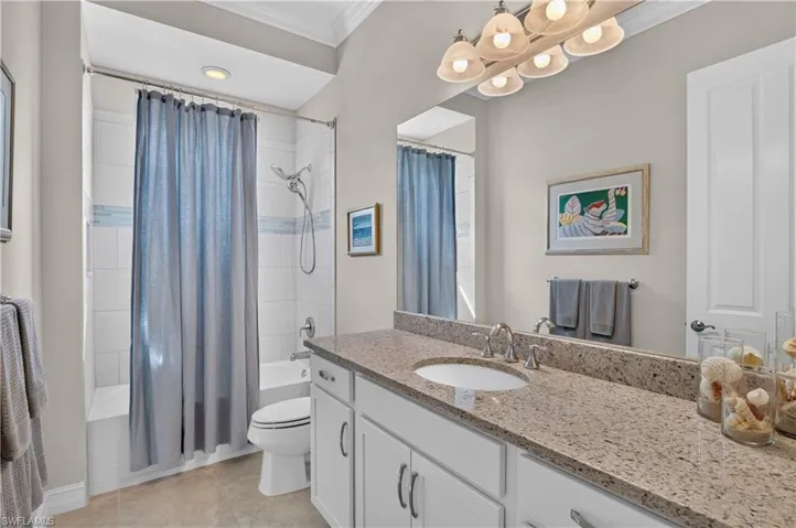 Guest bathroom with shower/tub combo.