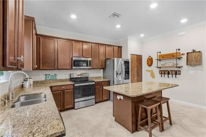 10100 Tin Maple Drive 12, Estero, Florida 33928