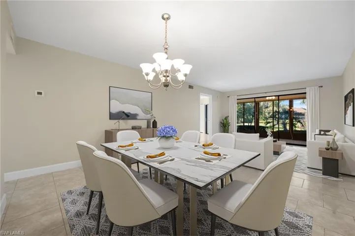 Dining space with a chandelier and light tile patterned floors
