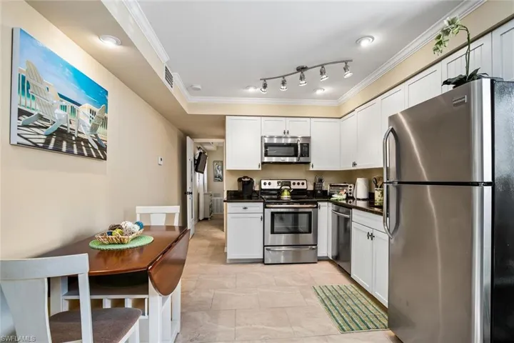 Casa Bella B Kitchen with granite countertops SS appliances and tile floors