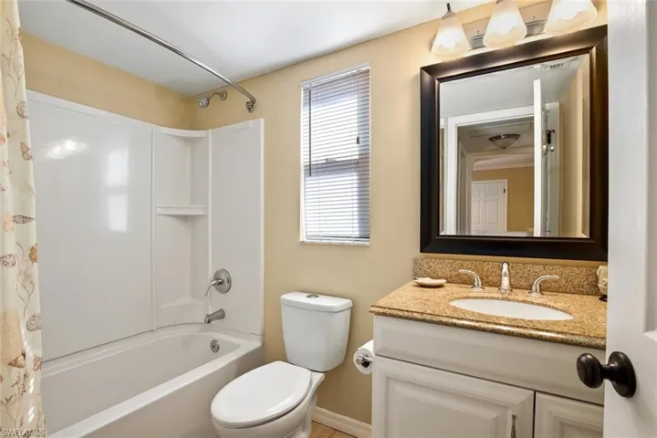 Casa Bella A King bathroom with vanity, shower / bath combination