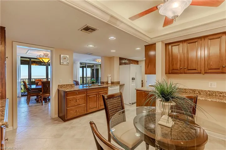 Dining room with recessed lighting, a ceiling fan, and visible vents