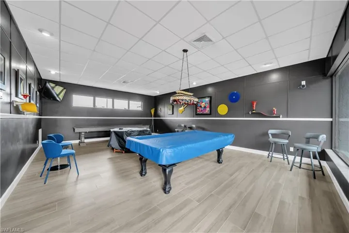 Recreation room featuring a paneled ceiling