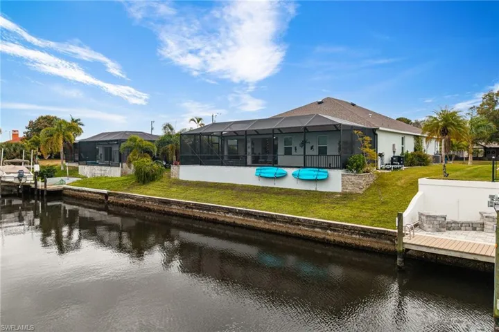 Back of Home with Seawall on Tranquil Canal