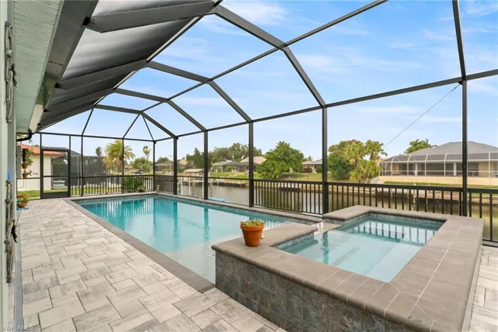 Large Heated, Saltwater Pool with Beach Edge & Spa