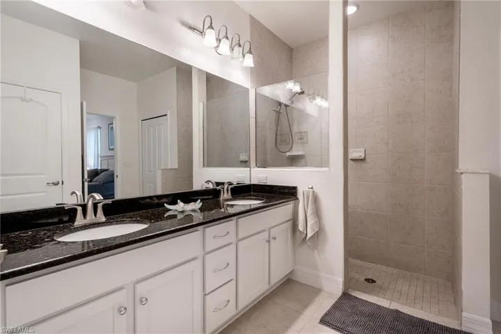 Primary Bathroom with Dual Sinks & Large Shower