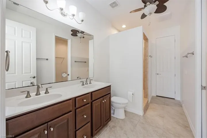 Owner'a Bathroom featuring  walk-in shower