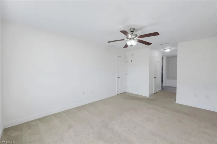 Hallway to dual closets