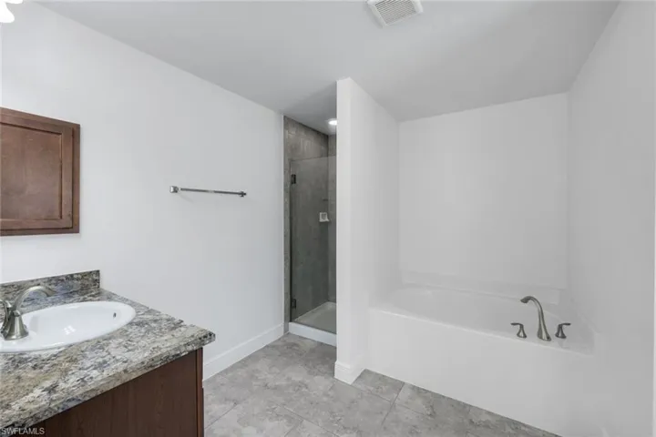 Shower and Tub in Primary