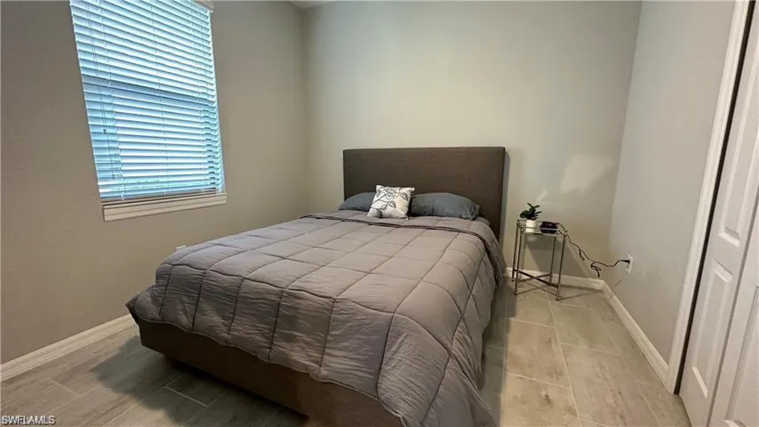 Bedroom with baseboards