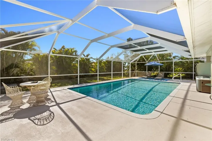 Pool featuring a lanai and a patio