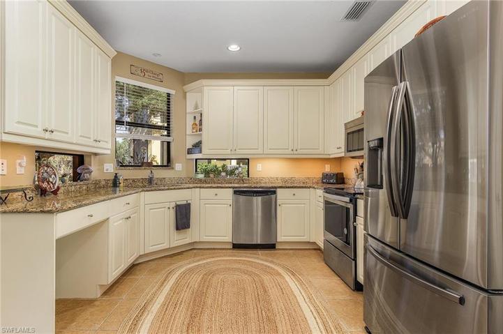 Note accent windows that allow natural light on the counters.  Also, counter have under the counter lights installed.