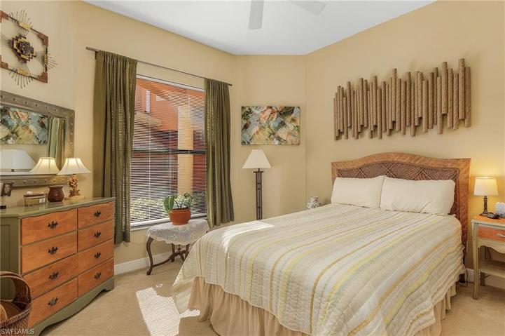 Guest bedroom just to the left of the front entry.  Window looks out toward the entry walkway.