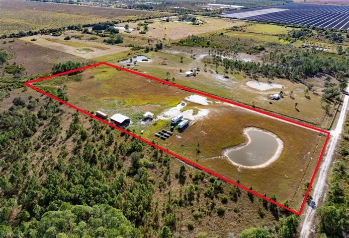 Overview of rural landscape featuring property parcel outlined