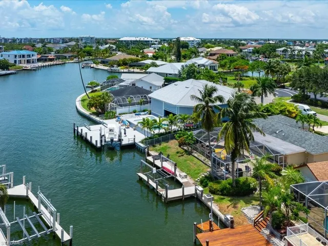 Aerial view of residential area with a nearby body of water