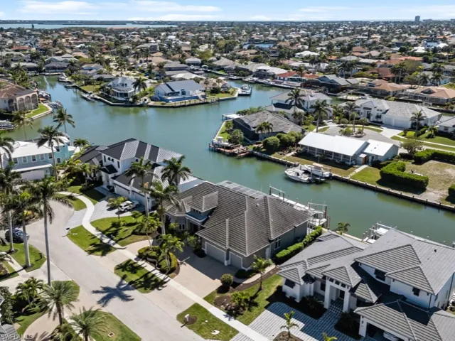 Aerial view with a residential view and a water view