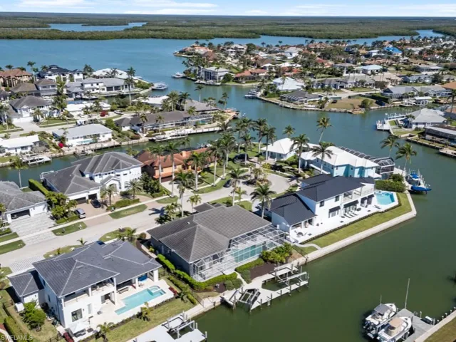 Aerial view with a residential view and a water view