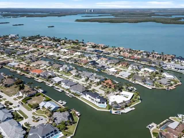Drone / aerial view featuring a residential view and a water view