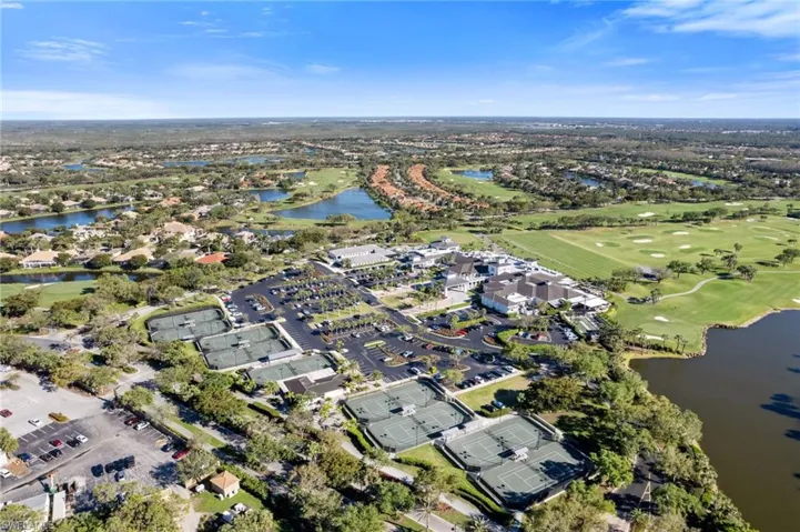 Bird's eye view featuring view of golf course and a water view