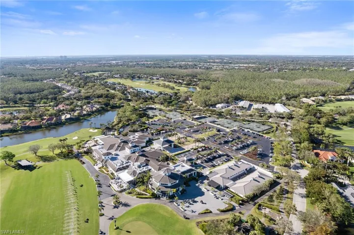 Bird's eye view featuring view of golf course, a water view, and a residential view