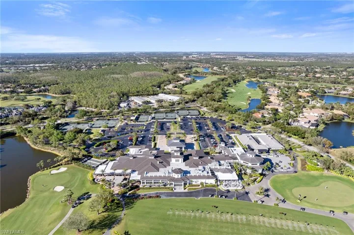 Aerial view with a residential view, view of golf course, and a water view
