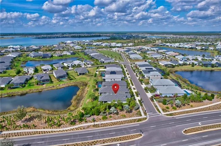Aerial view featuring a water view