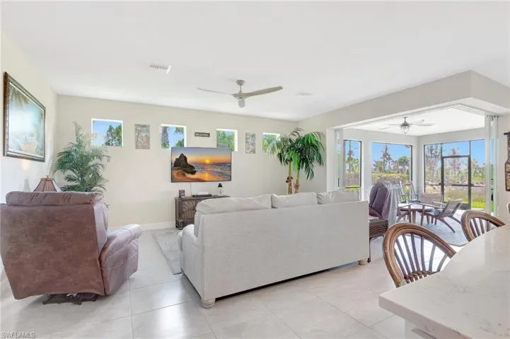 Tiled living room with ceiling fan