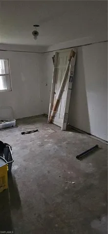 Empty room with concrete floors