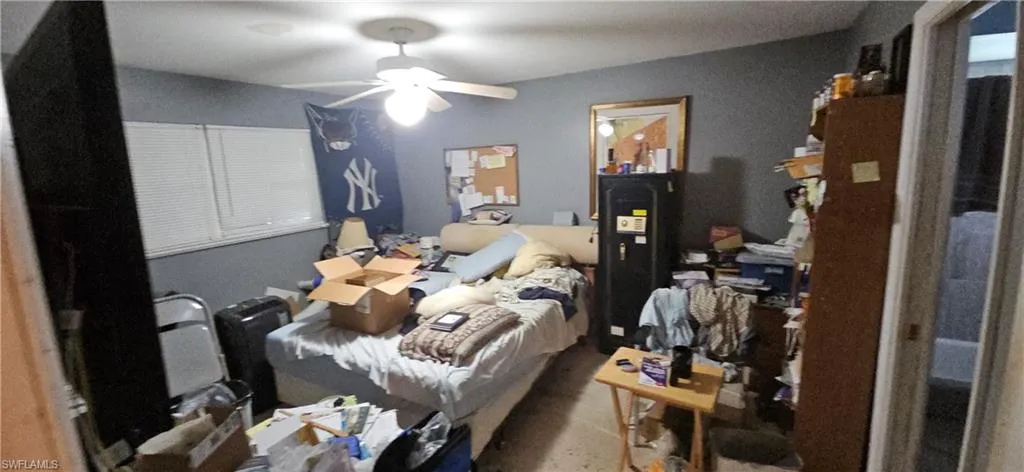 Bedroom featuring ceiling fan