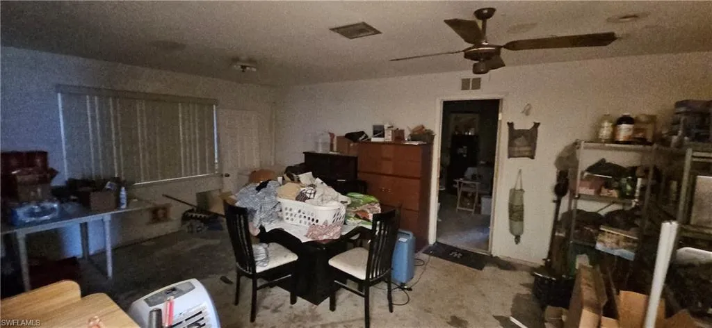 Dining area with ceiling fan
