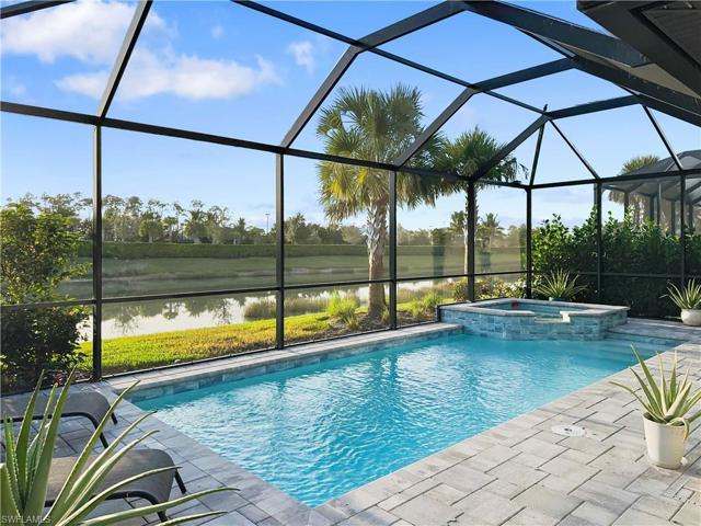 Beautiful pool, lake, and preserve views.