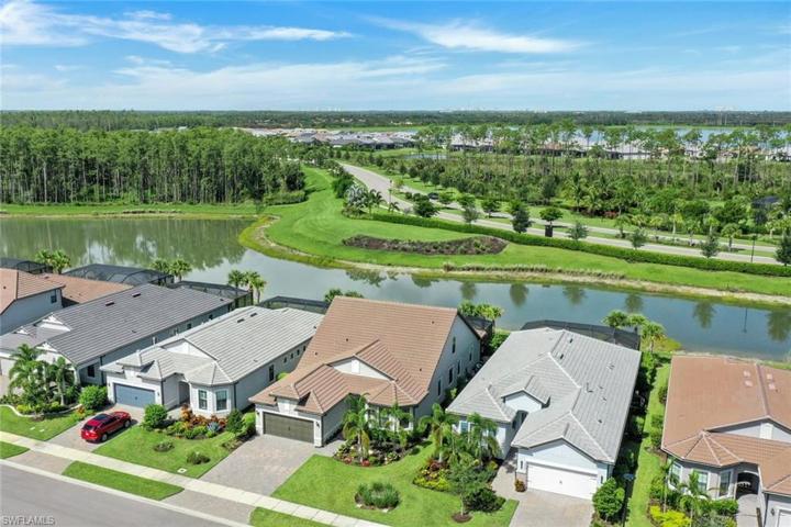 The oversize driveway and newly landscaped lot are added features of this home.