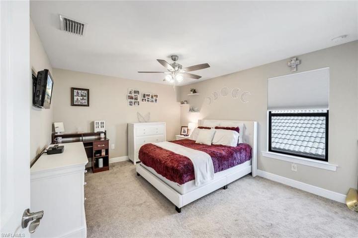 Bedroom #5, located upstairs and has its own full bath. The perfect guest suite as it sits next to the large bonus room.