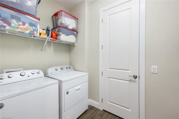 spacious laundry room with additional storage!