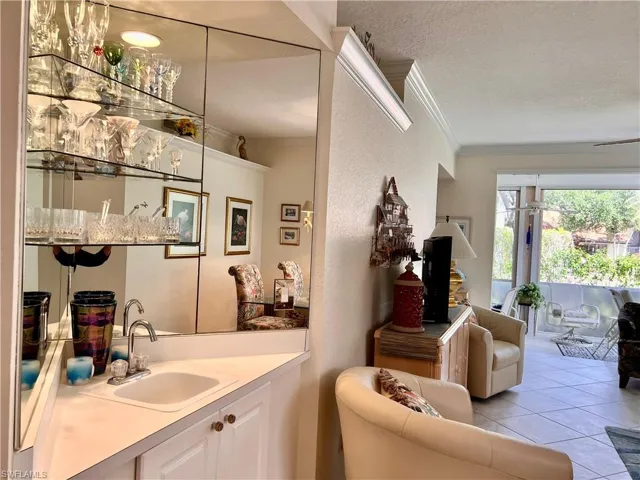 Built-In Wet Bar with Cabinet, Sink, Mirrors and Shelving