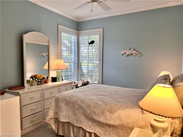 Charming guest bedroom with view of lake