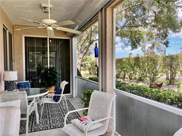 Spacious lanai in quiet area of community with view of lake