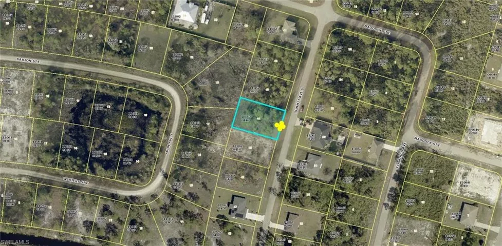 Aerial map of property and surrounding area featuring property parcel outlined