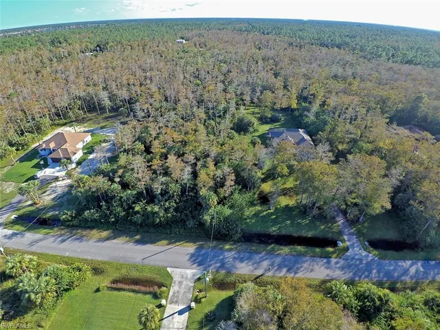 Lot located between two nice homes.