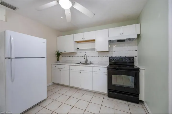 New cabinetry and backsplash!
