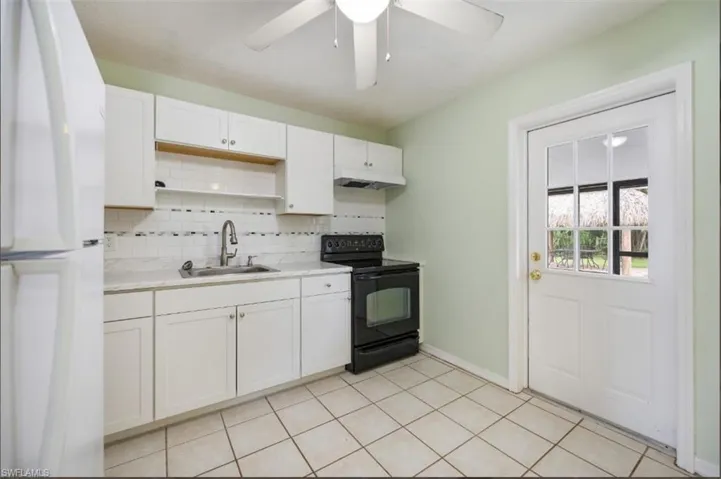 New cabinetry and backsplash!