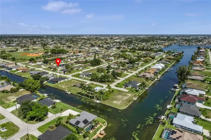 Canal-front property featuring a boat ramp just yards away and access to a large lake for lots of water fun!!