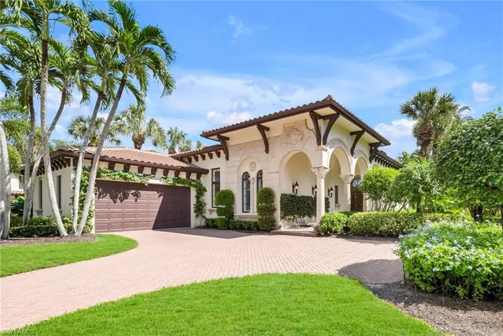This beautiful residence is located in the world-class Grey Oaks Country Club.