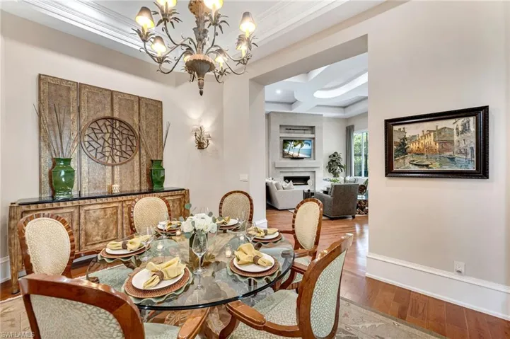 Originally, the dining room was closed off from the rest of the home, thus this room was transformed into an inviting room, with views to the rest of the home with walls removed, squared off archways, and custom lighting. Bon appétit!