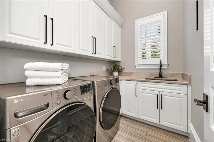 Nothing was left untouched, with quartzite counters, Kohler granite sink and faucet, new tile floors, new LG "Thin Q" washer & dryer, finished off with new planation shutters and Emtek hardware.