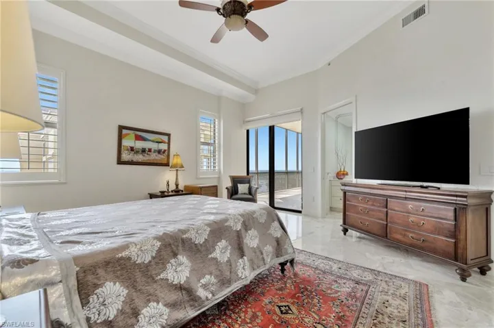 2nd master suite or guest room with 10' slider to the large screened in lanai off the kitchen.